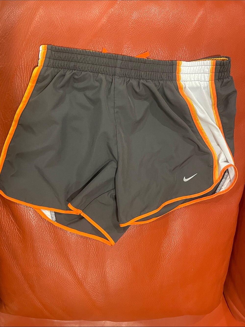 Nike Women’s Gray Athletic Shorts with Orange Trim